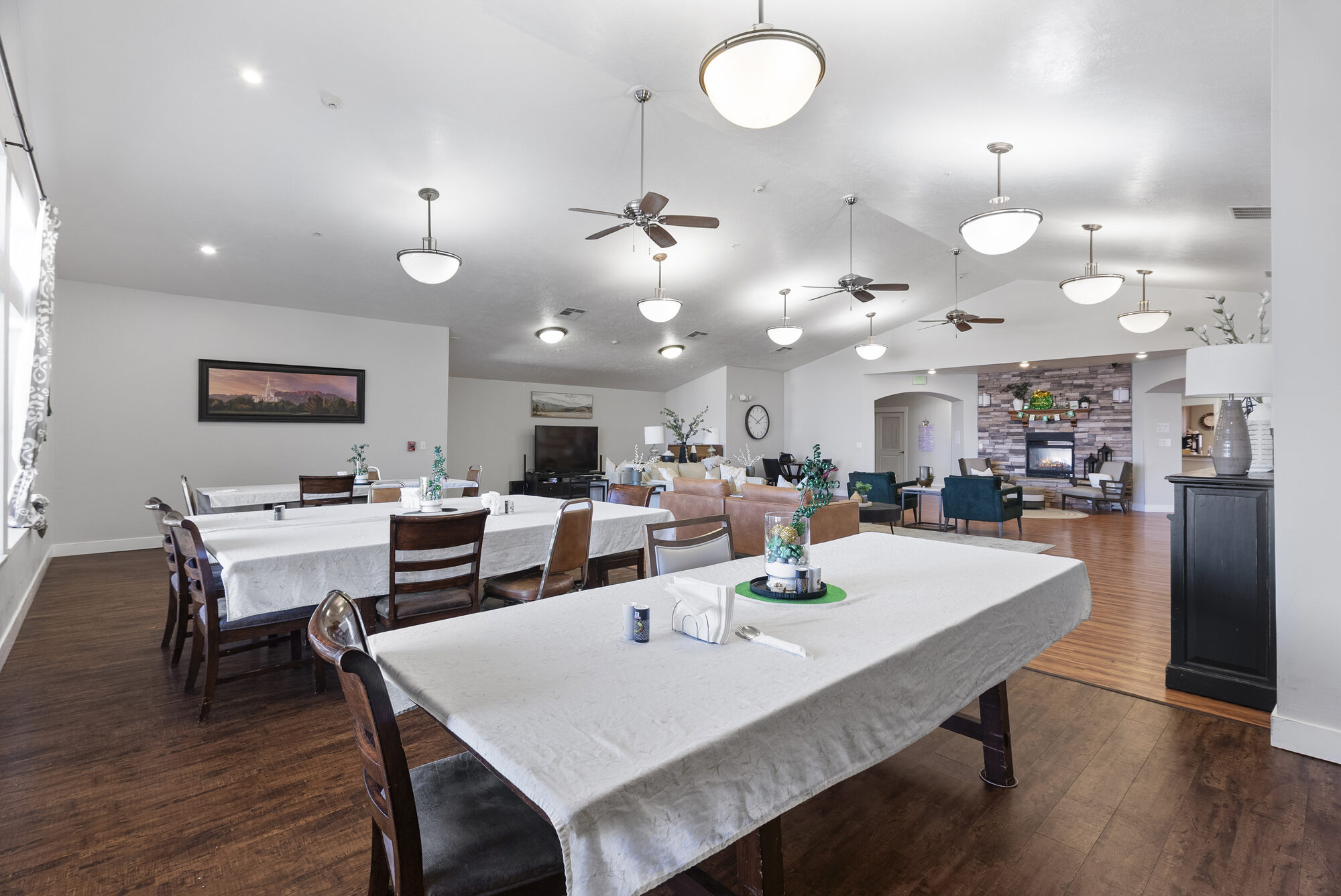 Family-style dining room opening onto the common area